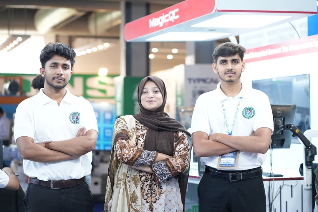 The Robionix team on the MagicQC stand at TextileAsia, Lahore Expo Centre.